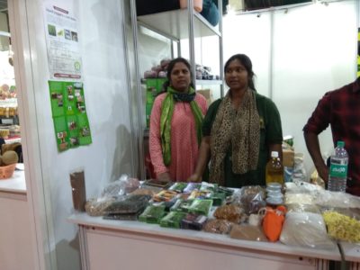Vasantha with another staff of Amrita Bhoomi, at a seed fair in 2019